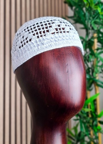 Taqiyah emirates met band